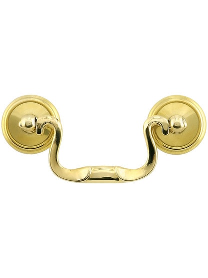 Swan-Neck Brass Banded Bail Pull with Round Rosettes ‚Äì 2 ¬Ω‚Äù Center-to-Center in Un-lacquered Brass.